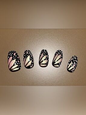 Custom made butterfly wing glue on nails